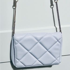 a. new day quilted leather handbag